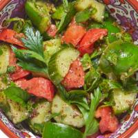 Fattoush Salad · The distinctive taste of fattoush comes from our zesty house-made sumac dressing that draws ...
