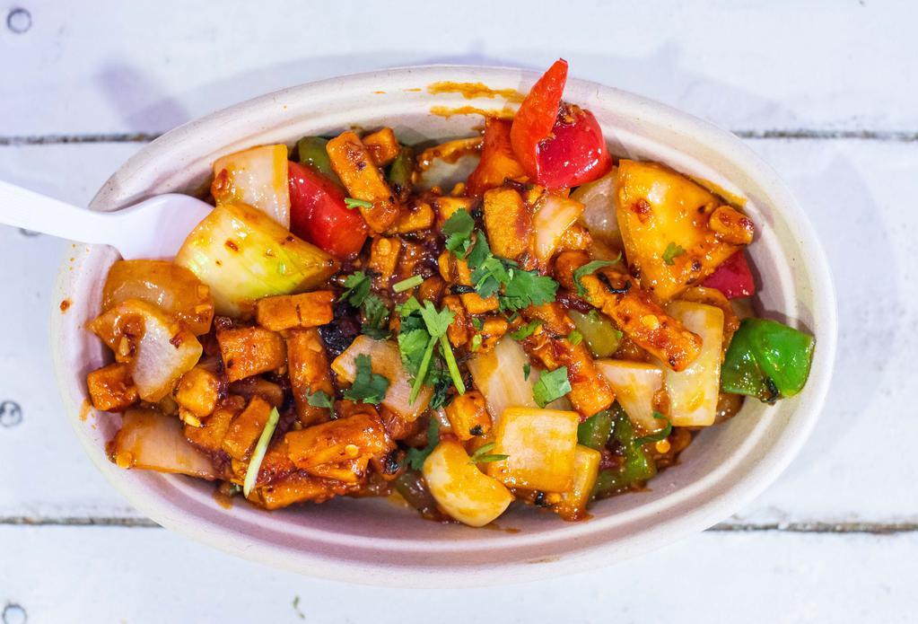 Chili Paneer · spiced cheese with bell peeers ,red onion and soy garlic