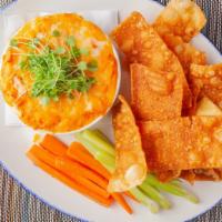 Buffalo Chicken Dip · fried wontons, gorgonzola dressing, carrot & celery sticks