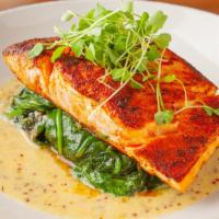 Blackened Salmon Fillet · cajun spices, garlic baby spinach, citrus beurre blanc.

*Consuming raw or undercooked  meat...