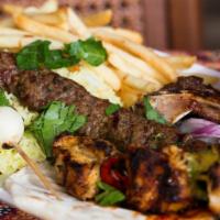 Mixed Grill · Two steak kabab, two pieces of bbq steak, two lamb chops, with mixed vegetables or french fr...