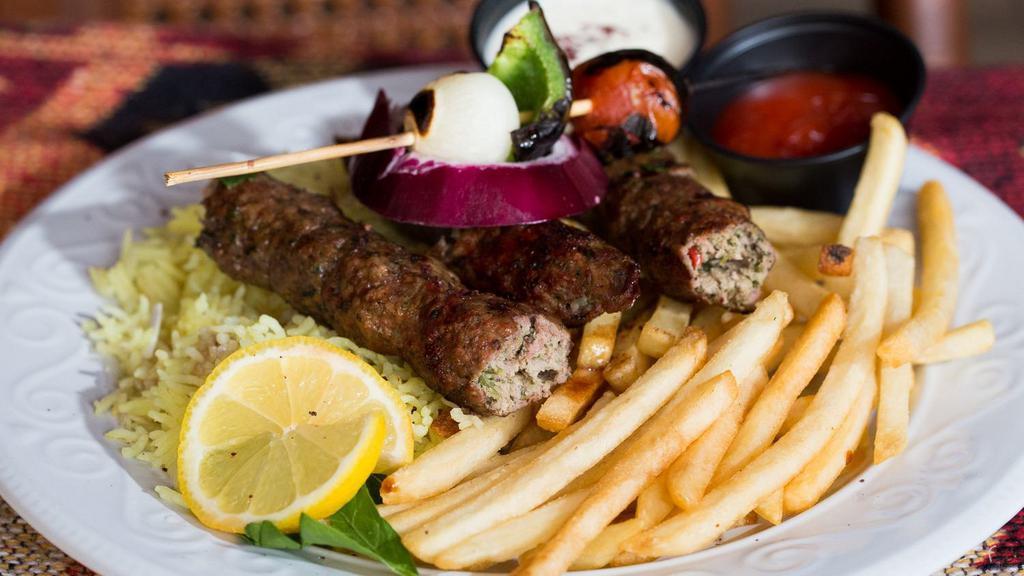 Lamb Kabab · Two steak kabobs, with mixed vegetables or french fries and special dip.