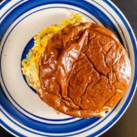 Portuguese Sweet Bread Sandwich · With two scrambled eggs with linguica, onions, pepper and cheddar cheese.