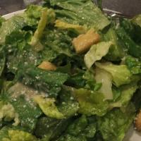 Caesar Salad (11) · Romaine lettuce tossed in our delicious Caesar dressing topped with pecorino Romano cheese a...
