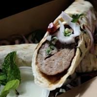 Kebab Chicken · Wrapped in lavash (flat bread)