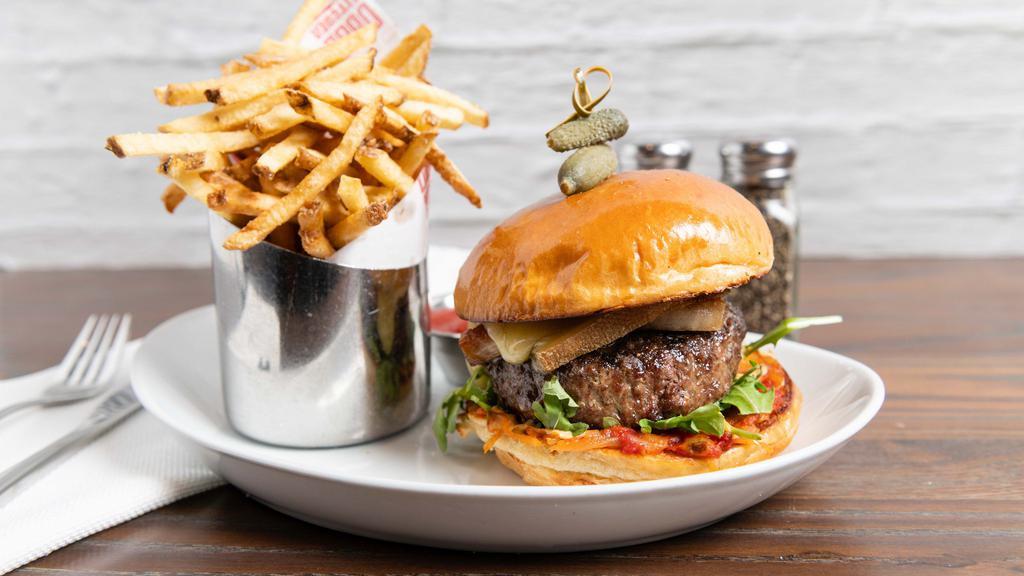 The Frenchie Burger · 8 oz beef pattie, raclette cheese, tomato-onion compote, pommes frites, confit pork belly (optional).