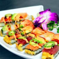Sushi Pizza · Thin rice & nori tempura topped with sashimi, avocado, tomatoes, jalapenos, eel and spicy ma...