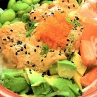 Hula Poke Bowl · Crabstick, avocado, edamame, tobiko, and sesame seeds with a creamy poke sauce.