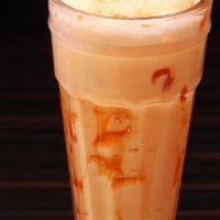 Sensational Mango Smoothie · Blended yogurt drink with mango pulp.