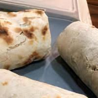 Chicken Fajita Burrito · Flour wrap with rice, black beans, pico de gallo, lettuce, sour cream and cheese and hot sau...