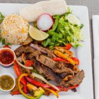 Combination Fajitas Plate · Steak and chicken grilled with peppers and onions, served with rice, salad, tortillas and ho...