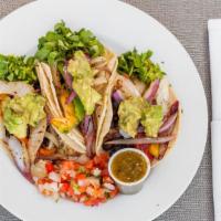 Veggy Tacos · Three tacos served with corn tortilla, grilled peppers, rice, beans, pico de gallo, guacamol...
