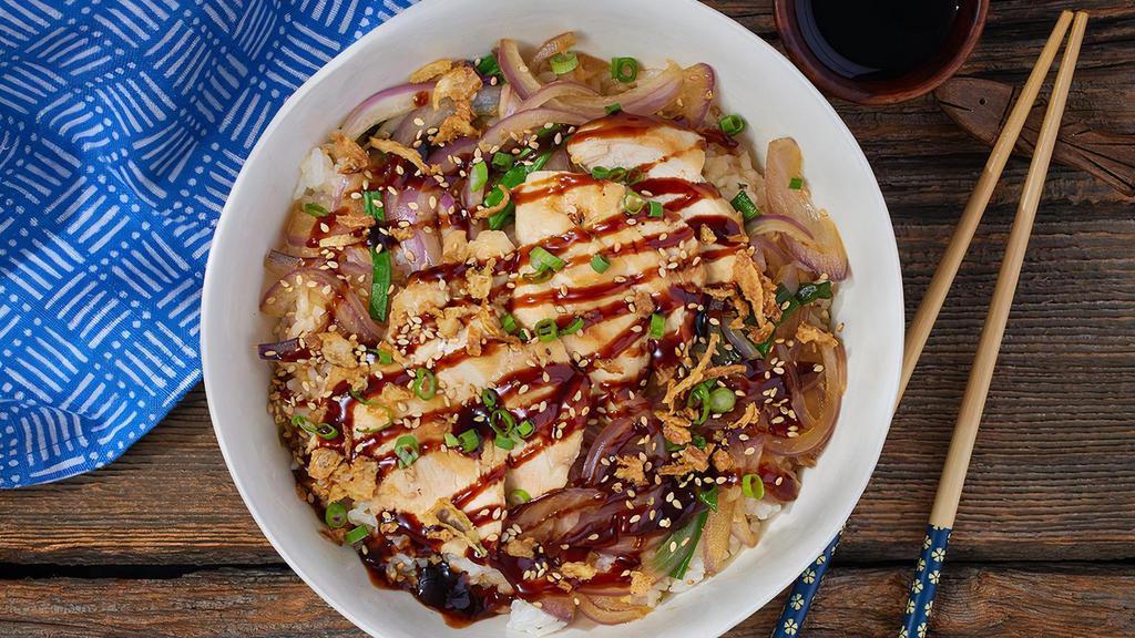Teriyaki Chicken Bowl · Grilled chicken breast, red onions, green onions over white rice topped with teriyaki sauce, sesame seeds and crispy onions