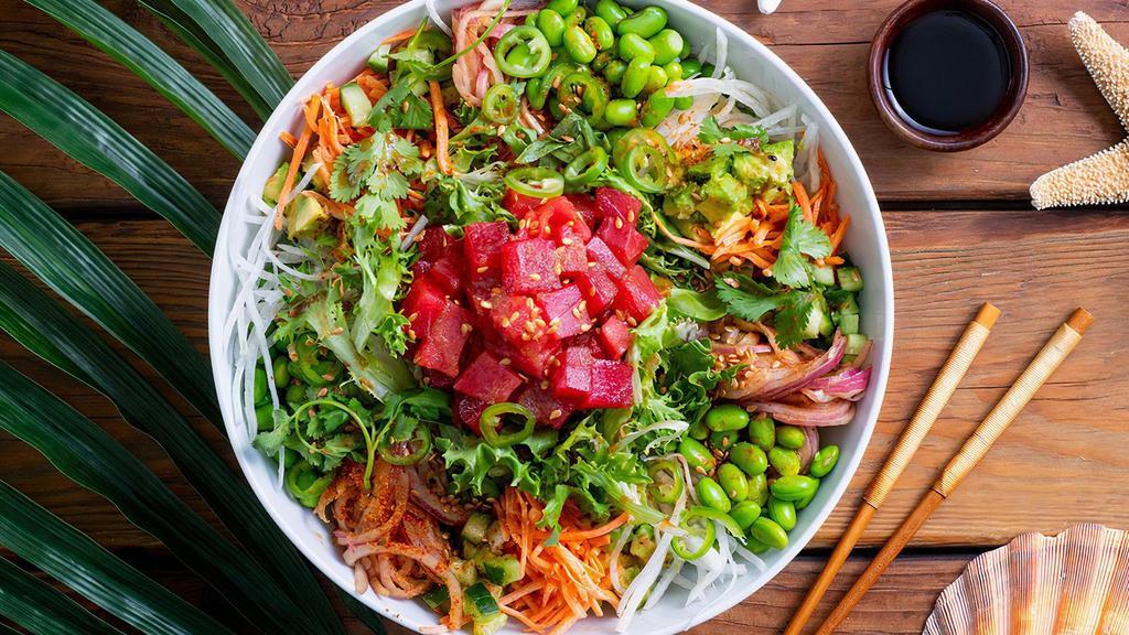 Ultimate Spicy Tuna Poke Bowl · Serves 2-4, your choice of white rice or mixed greens topped with Stonie size portions of  Spicy Tuna, Ponzu Onions, Cucumber, Daikon Radish, Carrots, Green Onions, Avocado, Edamame, Serrano Chilies, Cilantro, Togarashi Spice, Sesame Seeds and Onion Ponzu sauce