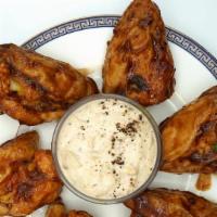 Bbq Chicken Wings · Tossed with a heaping of BBQ sauce.