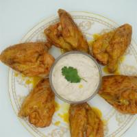 Smoky Honey Mustard Wings · Smothered in a yummy and smoky honey mustard sauce. Served with blue cheese dip