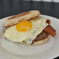 The Hangover Burger Sandwich · 8oz burger topped with bacon, cheese and an overeasy egg. Served on Jumbo English muffin