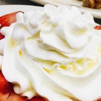 Strawberries & Cream Waffle · Fresh strawberries topped with whipped cream
