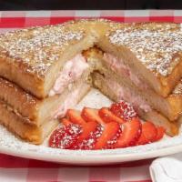 Strawberry Shortcake Stuffed French Toast · Three layers of texas french toast stuffed with our strawberry cream cheese.