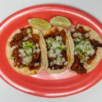 Tacos · Folded corn tortilla with your choice of meat.