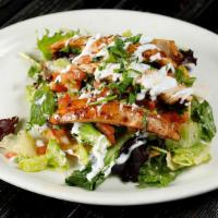 Tostadas · Fried crispy tortilla topped with rice, beans, lettuce, pico de gallo, sour cream and cheese.