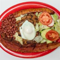 Montanero · Grilled steak, pork strip, egg, rice, beans, salad, plantain, and two tortillas.