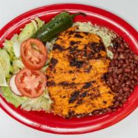 Pollo A La Plancha · Grilled chicken breast, served with rice, beans, salad and 2 tortillas.