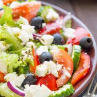 Greek Salad · Onions, green peppers, black olives & feta cheese.