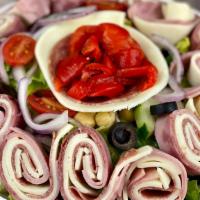 Antipasta Salad · Lettuce, tomatoes, onions, sweet peppers, pickles, olives, ham, salami, pepperoni, and provo...