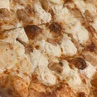 White Pizza · ricotta, mozzarella and grated romano cheeses with whole roasted garlic cloves.