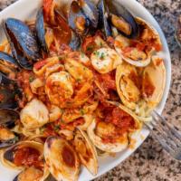 Frutti Di Mare · Shrimp, littlenecks, mussels, calamari & scallops sautéed in a homemade marinara sauce - als...