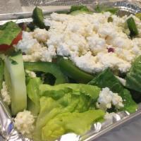 Greek Salad · Garden salad topped with crumbled Feta cheese and kalamata olives.
