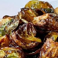Roasted Brussels Sprouts · Gluten-Free. Vegetarian. cranberries, maple balsamic reduction.