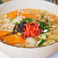 Veggie Miso Ramen /Veggie Shoyu Ramen · Choice of miso or shoyu-flavored noodle soup topped with broccoli, cabbage, carrots, onion, ...