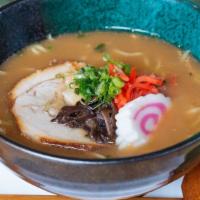 Shoyu Ramen · Pork broth merged with our soy-flavored wavy noodle soup, topped with marinated chashu pork,...