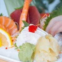 Sashimi Regular · Eight pieces of sushi assortment, spicy tuna roll.