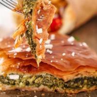 Spanakopita (Spinach Pie) · Spinach, feta cheese. Served with a side of tzatziki sauce.