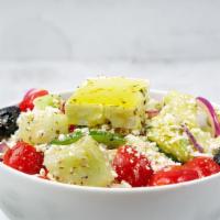 Side Village Salad · Tomatoes, cucumbers, red onions, green peppers, feta cheese, olives, and extra virgin olive ...