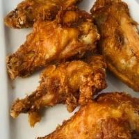 Chicken Wings · Chicken wings marinated with special sauce fried to crispy and served with a sweet chili sau...