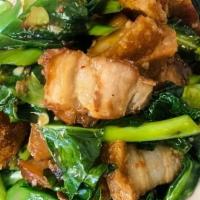 Kana Moo Grob · Stir-fried crispy pork with Chinese kale. Served with rice.