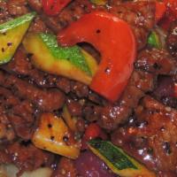 Black Pepper Beef · Sliced beef with onion, green and red pepper and zucchini sautéed with unique black pepper.