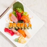 Sushi & Sashimi Combo · Six pieces sushi and 10 pieces sashimi and California roll.