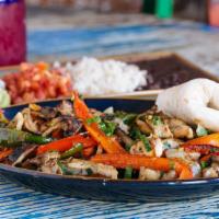 Fajitas · Peppers, onions, mushrooms, epazote, and cumin oil served with tortillas, choice of beans, p...