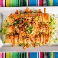 Tacos Dorados  · chorizo, potato. jack cheese, enchilada sauce, crema
 queso fresco & cilantro  wrapped in a ...