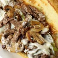 Mushroom Cheesesteak · Grilled rib-eye steak meat, cooked with tender mushrooms, topped with melted Provolone chees...