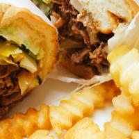 Philly Cheesesteak & Ham · Grilled rib-eye steak meat, topped with melted Provolone cheese and a generous portion of gr...