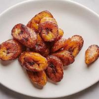 Fried Plantains · Ripe sweet plantains are fried until golden brown with a caramelized texture and sweet flavor
