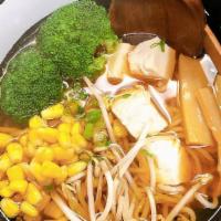 Vegetable Ramen · Soy base in mushroom broth, steamed tofu, bamboo, corn, broccoli, beansprouts, scallions.