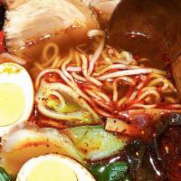 Akamaru Modern Ramen · Soy base in pork broth with chili oil, bok choy, bean sprouts, wood ear, black mushroom, egg...
