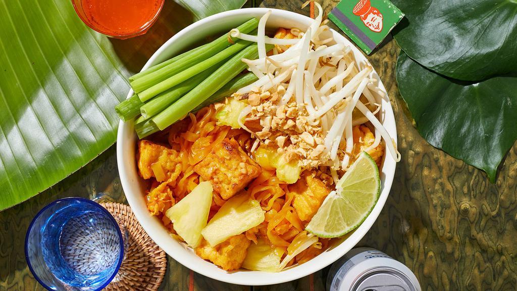 Pineapple Pad Thai · Stir-fried rice noodles with your choice of meat, pineapple, scallions, bean sprouts, scrambled egg, and crushed peanuts.
